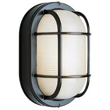 Salvaged from 1950's era ship this is solid brass with rough cast appearance and aged ribbed glass cover. Trans Globe 8 1 2 Oval Bulkhead Light 236095 Lighting At Sportsman S Guide