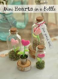 Mini Hearts In A Bottle Tiny Felt Heart Flowers Inside A Glass Jar Create A Magical Terrarium Garden Crafts With Glass Jars Bottle Crafts Mini Glass Bottles