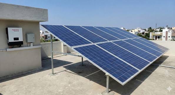 Rooftop solar panel installation on an Indian home
