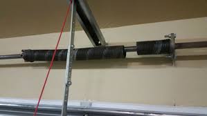 Wood) that is opened/closed multiple times a day will last half the time of the lighter door. When To Replace Your Garage Door Springs Allied Doors West Florida Inc Residential Commercial Garagedoors