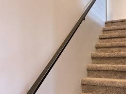 It's a very simple system, although every manufacturer's approach is different. Wall Mounted Rectangular Metal Handrail Great Lakes Metal Fabrication