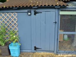 You might need to add traction strips or a mat on the ramp to help wet, webbed feet navigate. Build An Easy To Clean Duck Coop With Attached Storage Diy Danielle