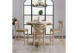 Log pub tables and log pub sets are here in a variety of styles and finishes. Elements International Callista Rustic Round Counter Height 5 Piece Dining Set Lindy S Furniture Company Pub Table And Stool Sets