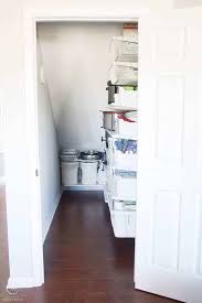 I planned on three 10″ deep shelves using a level and a straight edge, we marked where the shelves would go, and carefully screwed the shelf bases. How To Organize A Closet Under The Stairs Pantry Organization Ideas