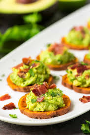 Sweet Potato Bites With Bacon And Avocado Great Finger Food For Game Day Paleo Gl Sweet Potato Appetizers Sweet Potato Appetizer Recipes Sweet Potatoe Bites