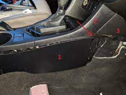 Have already purchased bulb but can't find out how to get to the old bulb out. Remove Trim Around Center Console To Lift Carpet 2015 Corolla Le Us Model Corolla Club Toyota Owners Club Toyota Forum