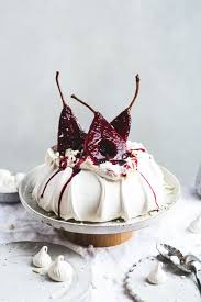 Hibiscus Poached Pear Pavlova The Polka Dotter Recipe Pavlova Poached Pears Desserts