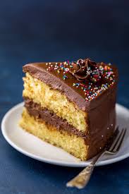 Classic Yellow Cake With Creamy Chocolate Frosting Baker By Nature Recipe Creamy Chocolate Almond Cakes Cake