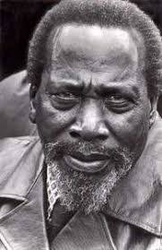 Jomo Kenyatta (Johnston Kamau Ngegi) was an ugly man whose name and face  should be removed from our country's monuments, airports, roads, buildings  and currency using sulphuric acid. He was not just