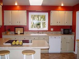 In case you are wondering, the yellow wall color is benjamin moore's pale moon 289. Red Kitchen Red Kitchen Walls Red Kitchen Paint For Kitchen Walls