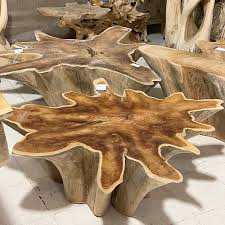 The pedestal is made from genuine teak roots that are dug up, cleaned, sanded and finished with a clear lacquer coat. Artisan Furniture Finds Sold Teak Root Star Coffee Table