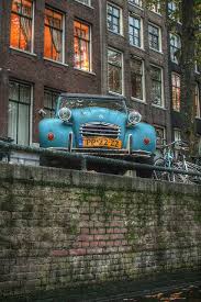 The car seat laws in the netherlands are consistent with much of western europe, requiring that those under the age of 12 and shorter than 1.35m (4 ft, 6 in). Een Eendje Aan De Gracht Amsterdam Holland Holland Netherlands I Amsterdam