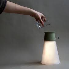 Meet Wat A Lamp Powered By Water A Few Drops Of Water Kick Starts The Process Where It Combines With A Hydroelectric Batte High Tech Gadgets Lamp Tech Gadgets