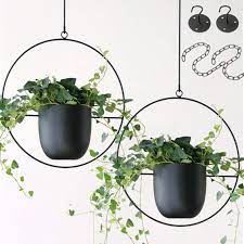 Luckily, houzz is a great destination for where to buy modern hanging planter indoor pots & planters along with plenty of home decor, accessories, and furnishings so you can personalize your home to your unique style. Amazon Com Abetree 2 Pcs Hanging Planters For Indoor And Outdoor Plants With Hooks And Chains Metal Modern Wall And Ceiling Planter Minimalist Flower Pot Hold Planters Hanger For Home Decor Black Kitchen