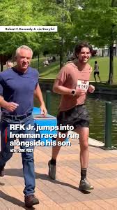 US Secretary of Health and Human Services Robert F. Kennedy Jr. briefly  joined an Ironman championship to run alongside his son. 💪 | New York Post  Video | Facebook