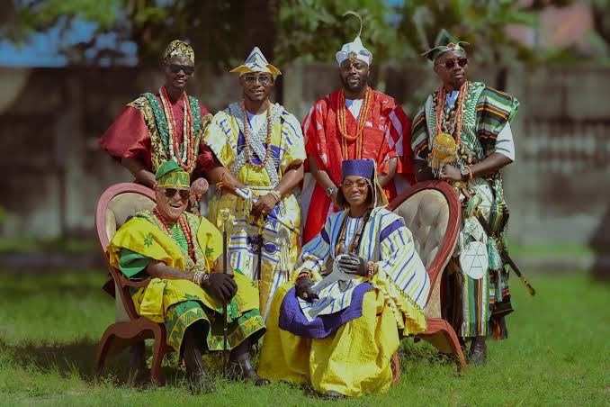 The vibrant, competitive high-fashion display of the Regberegbe age-grades at Ojude Oba, AI generated