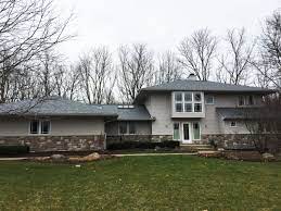 Bulk of the construction will be done on the front of the garage. Owens Corning Duration Quarry Gray