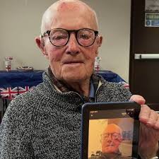 A 100-year-old man is learning to use new technology as part of a digital  literacy scheme.