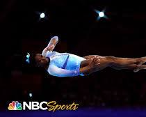 Hình ảnh về Simone Biles performing a gymnastics move