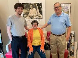 A fun photo op today as Neil and Michele Lipsitz stopped by the HBF office  to show their son Adam the wonderful shoe fitting ”couch” from Lipsitz  Department Store