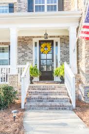 Decorating your porch as interesting as possible will never go wrong. 16 Spring Wreaths For The Front Door Front Porch Decor Kelley Nan