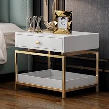This piece of furniture is a console table that represents a functional and contemporary style. Modern Nightstand Side Table End Table With 2 Drawers White Gold Modern Side Table Bedroom White Side Table Bedroom Modern Side Table Design