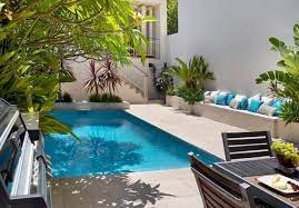 Fiberglass pools are very common structures in outdoor recreational design because it is an for more intricate poolhouse designs there are often small to large bathrooms, laundry rooms. 2 Small Backyard Ideas Designing Chic Outdoor Spaces With Swimming Pools Small Backyard Pools Small Backyard Design Pool Landscape Design