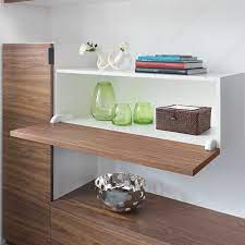 European hinges have a mounting plate that secures to the cabinet and a cup that seats in a (typically 35mm) circular mortise drilled in the back of the door. Pacta Drop Down Door System Richelieu Hardware