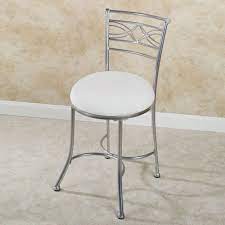 Let the natural cherry finish harmonize with your cabinets, or choose a subtle antique ivory so that your seafoam shower tiles can take center stage. Durand Vanity Chair