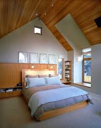 The win point in this attic living room is the combination of the roof ceiling walls with creamy foundation and usage of a warm colors and soft fabrics such as the hot green velvet sofa. 32 Attic Bedroom Design Ideas