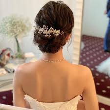 ウェディングヘアメイクルーチェ on instagram 挙式スタイル ルーズなシニヨンスタイルにシルバーの小枝がドレスとの相性とても素敵でした ヘアメイク ルーチェ橋本ひろみ ブライダルヘアメイク ヘアメイクルーチェ ウェディング ヘア