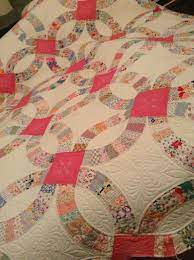Pin By Debbie Przymus On Wedding Ring Quilts Double Wedding Ring Quilt Quilting Designs Patterns Wedding Ring Quilt