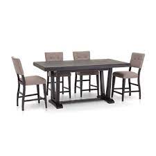 For a more modern style, round dining tables with a metal frame add a sleek vibe to the room. Dining Furniture Furniture Row