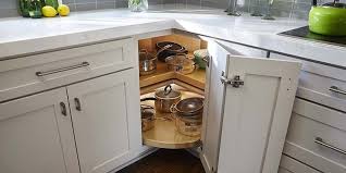 Lazy Susan Corner Cabinet With Two Rotating Trays Storing Cooking Pans And Measuring B Corner Kitchen Cabinet Kitchen Cabinets Hinges Lazy Susan Corner Cabinet