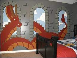 Love the dragon peeking out from behind the dresser. Magical Boys Rooms Bedroom Theme Wizard Bedroom Theme Baby Room Decorating Dragons Wall Murals Diy Kids Wall Murals Kids Room Wall Decor