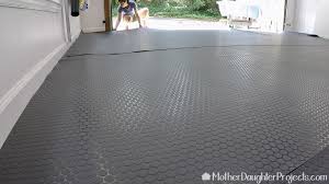 Garage floor tiles are the high end of floors, at least with our tiles anyway. Diy Vinyl Garage Flooring Vinyl Garage Flooring Flooring Garage Floors Diy