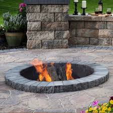 A concrete paver fire pit also looks great on top of a concrete patio as well as a lawn. Ultimate Fire Pit Outdoor Fireplace Buying Guide Best Tips For 2021