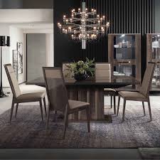 Calpe table + 4 chairs £399. Medina High Gloss 160cm Extending Dining Table