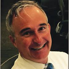 Patient with sickle-cell trait. A and B) Black sunbursts in the tem...