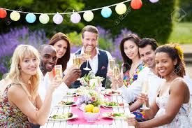 Find the perfect retro dinner party stock photo. Group Of Friends Enjoying Outdoor Dinner Party Stock Photo Picture And Royalty Free Image Image 31012711