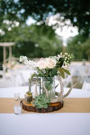 Diy Antler And Wooden Centerpiece Rustic Wedding Centerpieces Antler Wedding Decor Wedding Table Centerpieces