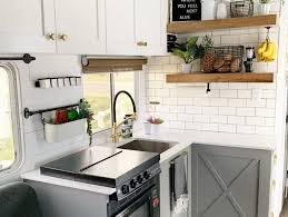 If your camper bathroom doesn't have a cabinet, or you just don't have enough room in the cabinet to store all your toiletries, install a towel bar on an empty wall. 30 Rv Kitchen Makeovers That Will Inspire Your Inner Designer