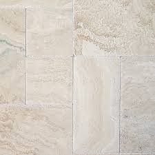 The least common finish, brushed travertine has been slightly smoothed with a wire brush, leaving a surface with more texture than honed travertine, but not quite as textured as tumbled travertine. Tuscany Ivory Onyx Travertine Versailles Pattern Tiles