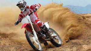 William dickson invented the movie camera while working for edison. Person Riding Red And White Motocross Bike Hd Wallpaper Wallpaper Flare