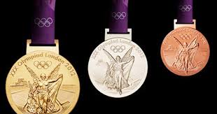 Bearing a design that celebrates the relationship between the strengths of olympic heroes and the forces of nature, the 500g gold, silver and bronze medals were made with sustainability at their heart. Olympics London 2012 Medals Olympic Medals Olympic Games Olympic Gold Medals