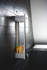 Concealed Bathroom Storage The Wallcover Is Continuous Across Drawer Faces With Only The Handles Visibly Obvious Coordinate Those With The Fixtures