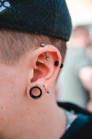 Punk Pictures Hq Download Free Images On Unsplash Guys Ear Piercings Face Piercings Men S Piercings
