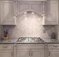 A white kitchen is especially perfect for experimenting with softer muted tones, such as this mint, in a backsplash. Kitchen Backsplash Silver Pearl Marble 1 X4 Herringbone Backsplash Onyx France Inc Woodbrid Herringbone Backsplash Beadboard Backsplash Marble Backsplash