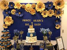 Paper Flowers Done With Royal Blue And Gold Cardstock Goes Well For A Prince Theme Bir Prince Birthday Theme Prince Birthday Party Royal Prince Birthday Party