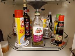 Yknow how your oil shelf always gets oily, and sucks to clean? Try beer  coasters. Ive never had to clean this shelf since! : rlifehacks